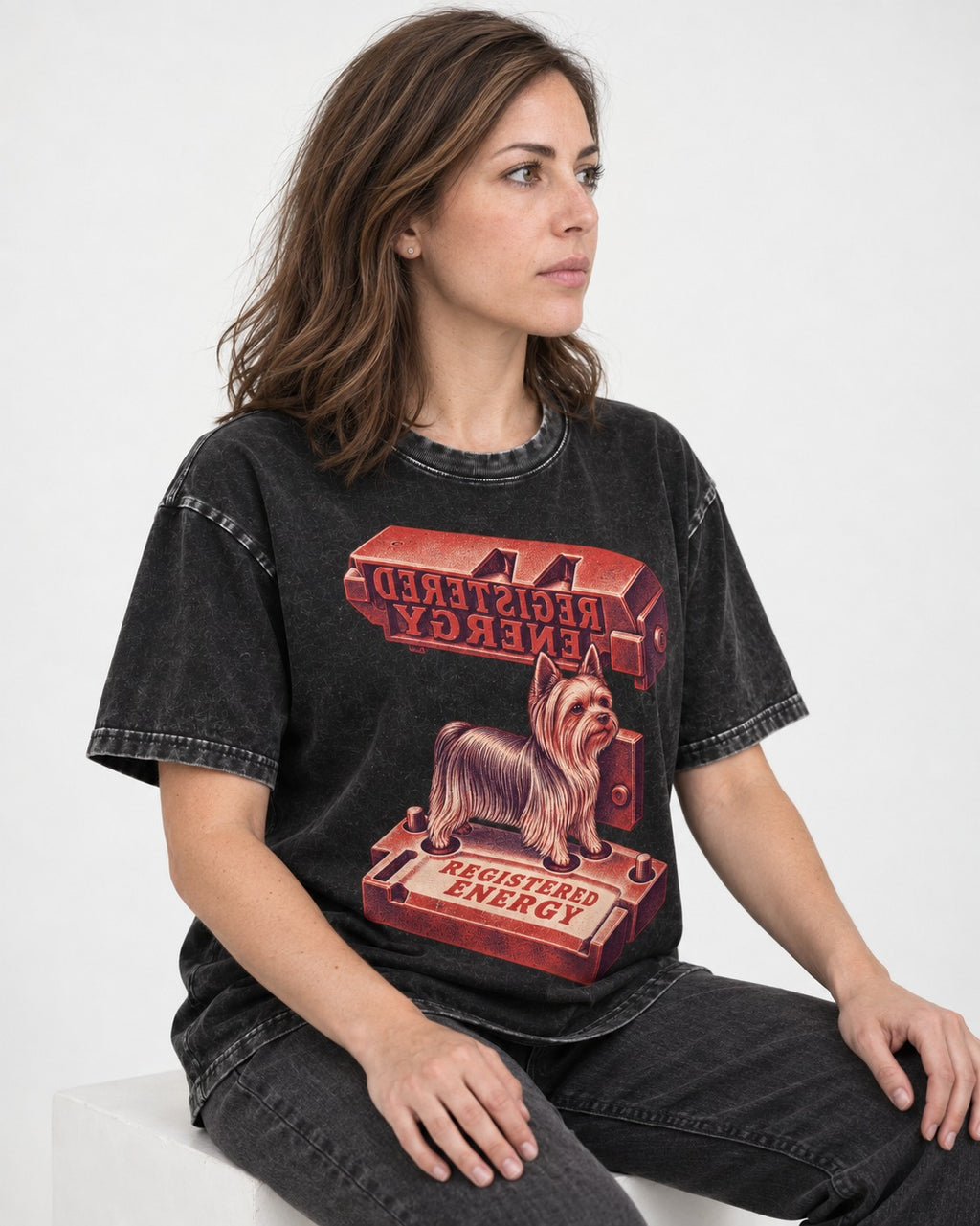 Yorkshire Terrier Registered Energy Stamp Press Graphic Washed Tee in Black, worn by a seated model
