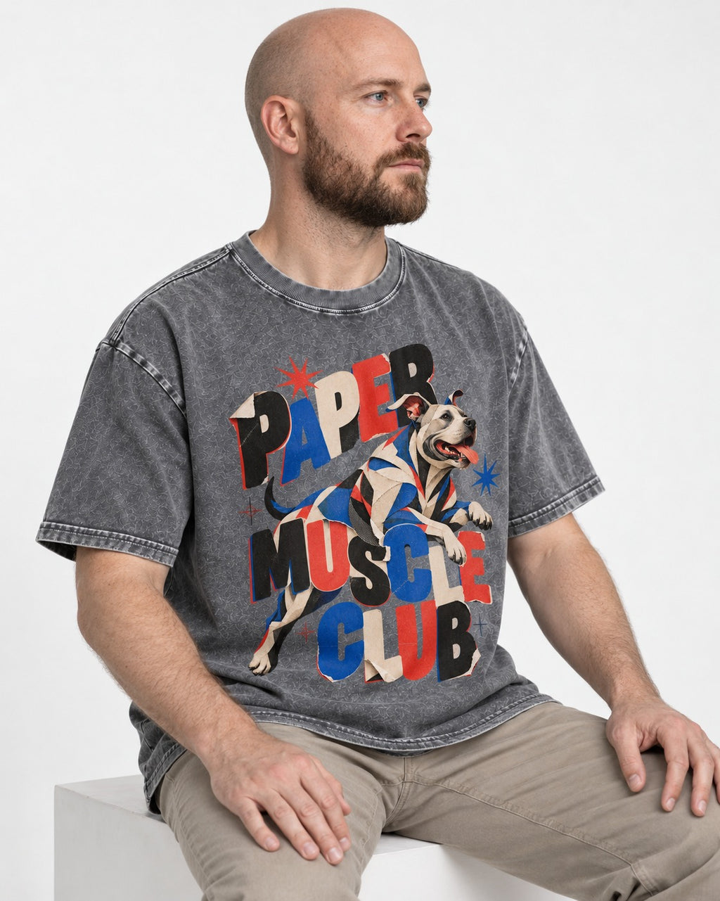 Pitbull Paper Muscle Club Collage Graphic Washed Tee in Gray, worn by a seated model
