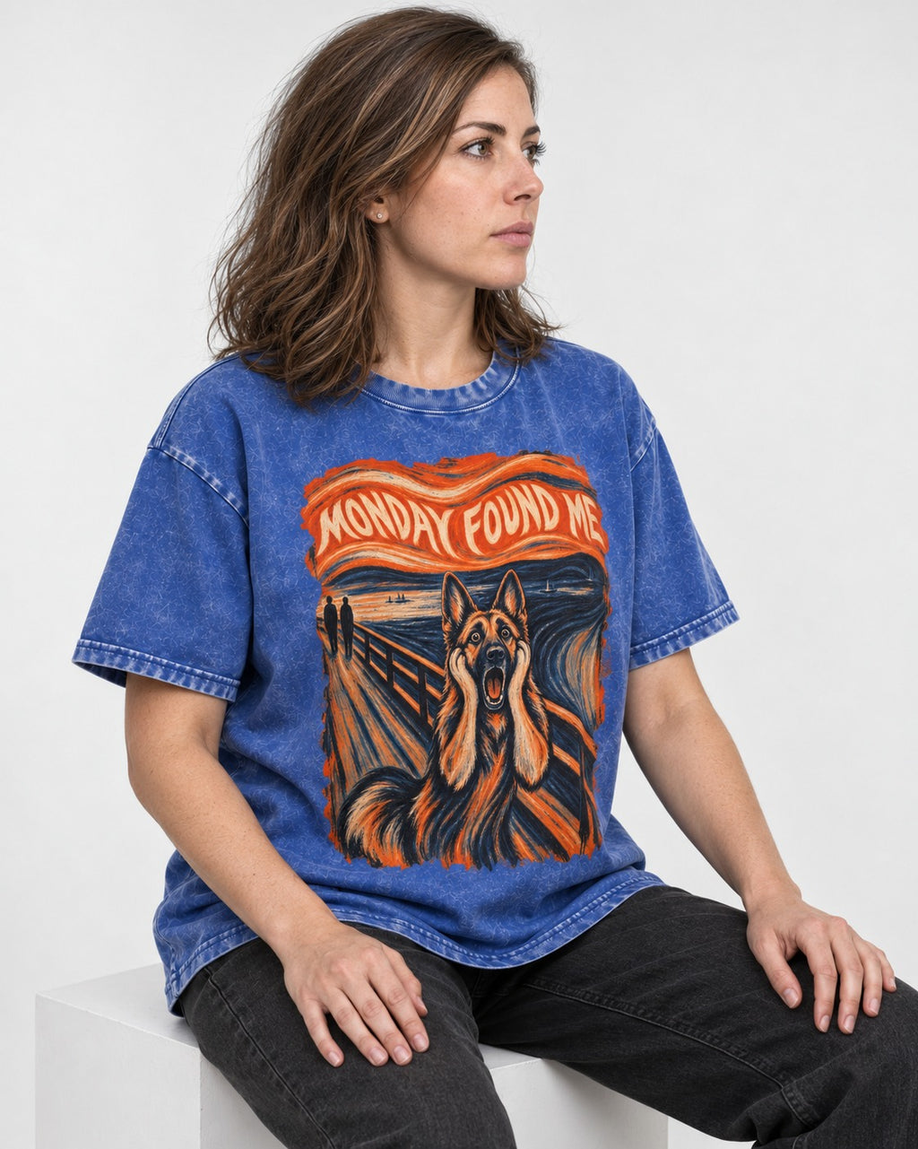German Shepherd Dog Monday Found Me Scream Graphic Washed Tee in Royal Blue, worn by a seated model