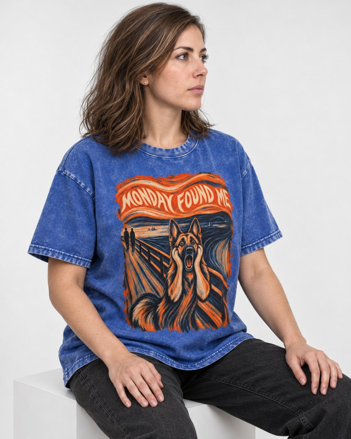 German Shepherd Dog Monday Found Me Scream Graphic Washed Tee in Royal Blue, worn by a seated model