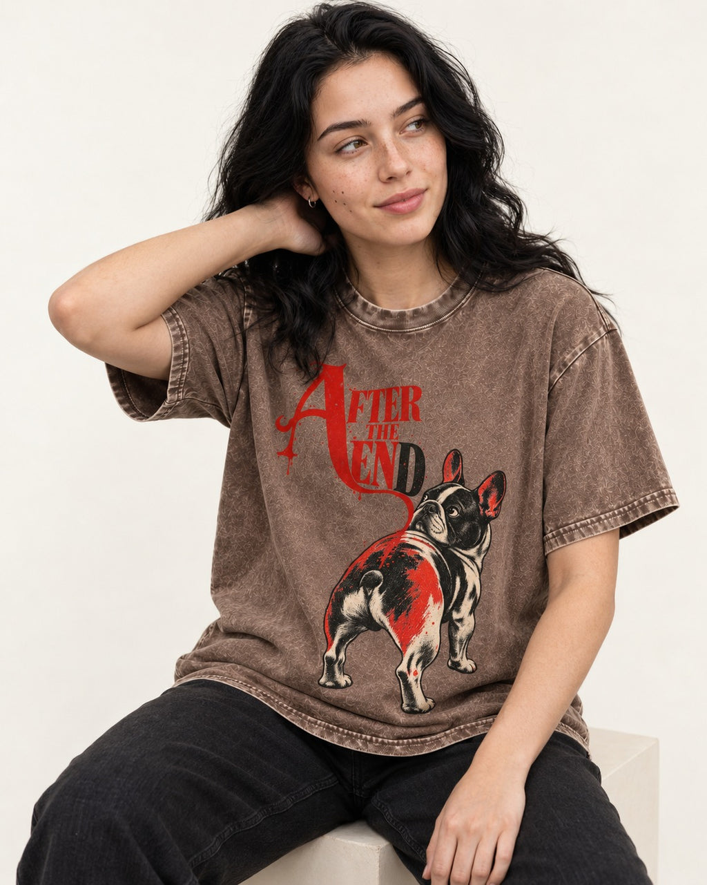 Frenchie After the End Washed Tee in Coffee, worn by a seated model