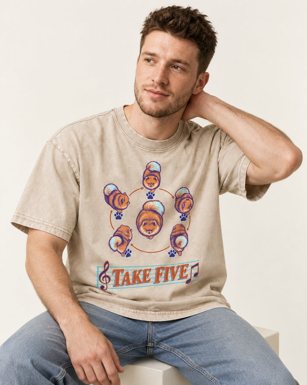 Pomeranian Take Five Choreography Cycle Graphic Washed Tee in Apricot, worn by a seated model