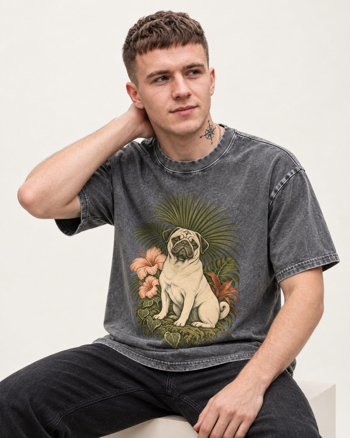Pug Paradise Washed Tee in Gray, worn by a seated model