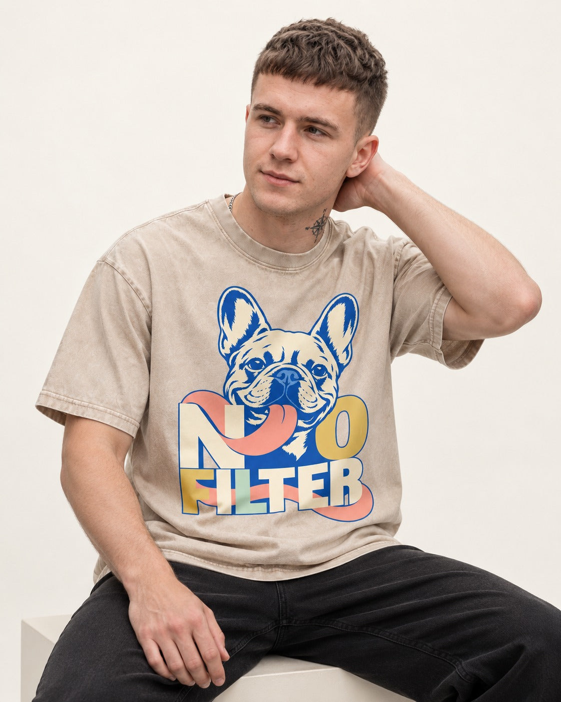 No Filter Frenchie Washed Tee in Apricot, worn by a seated model