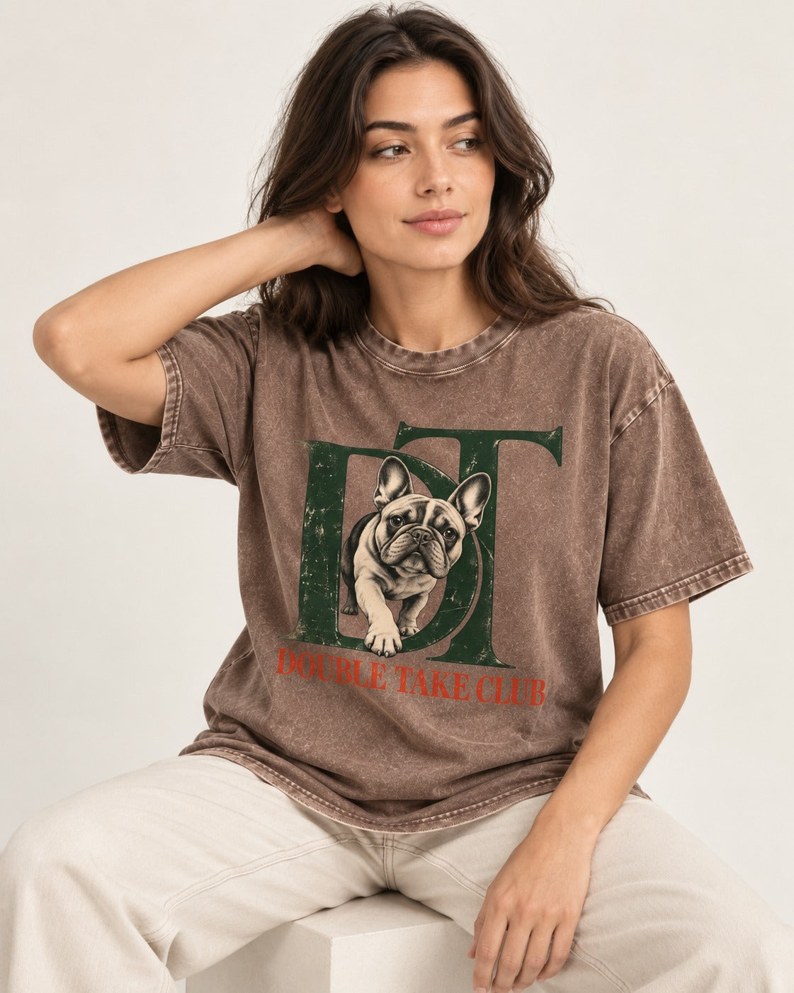 Frenchie Double Take Club Washed Tee in Coffee, worn by a seated model