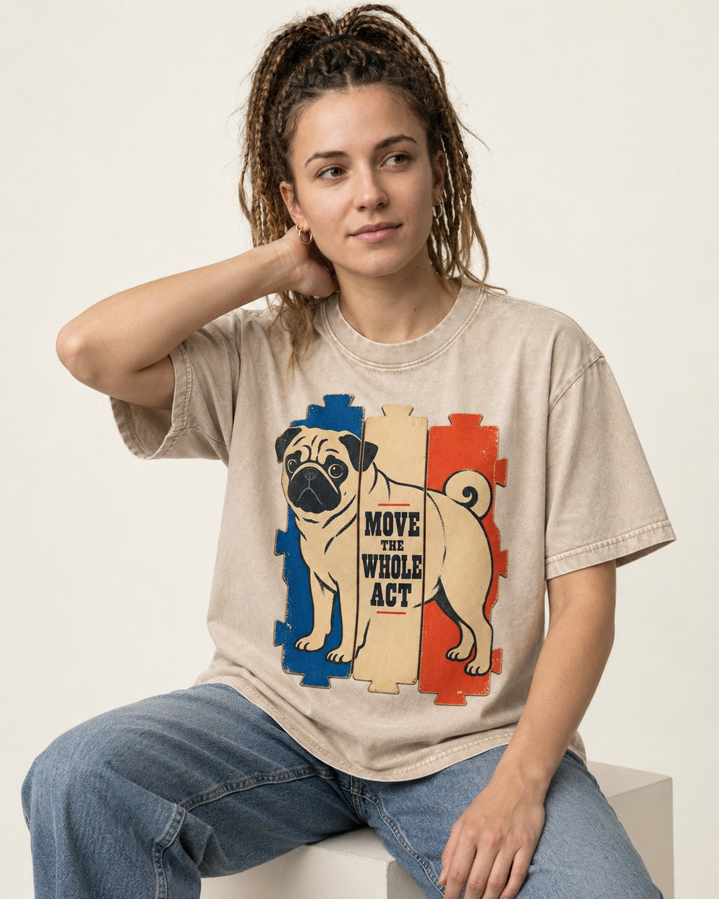 Pug Move the Whole Act Color Block Graphic Washed Tee in Apricot, worn by a seated model