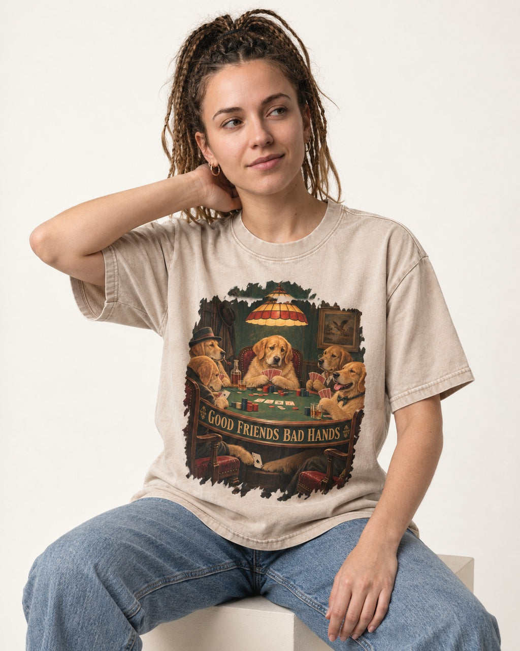 Good Friends Bad Hands Poker Golden Retriever Graphic Washed Tee in Apricot, worn by a seated model