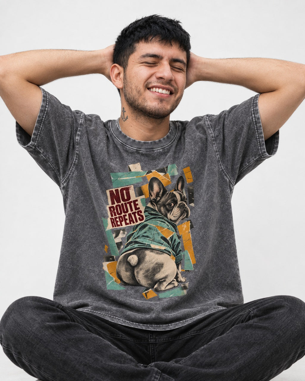No Route Repeats Frenchie Washed Tee in Gray, worn by a seated model