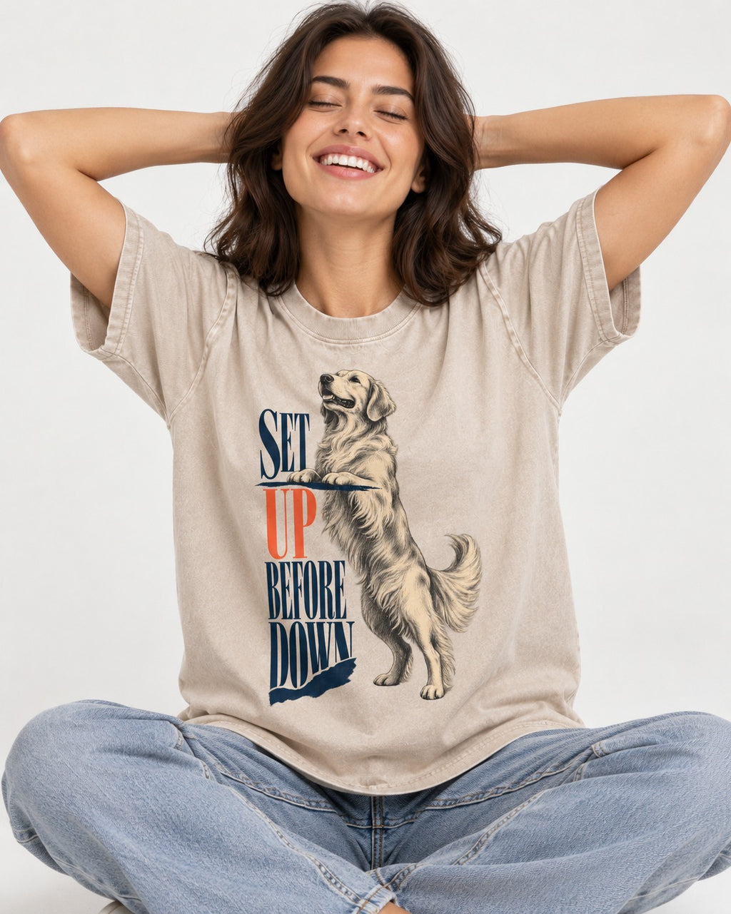 Golden Retriever Set Up Before Down Washed Tee in Apricot, worn by a seated model