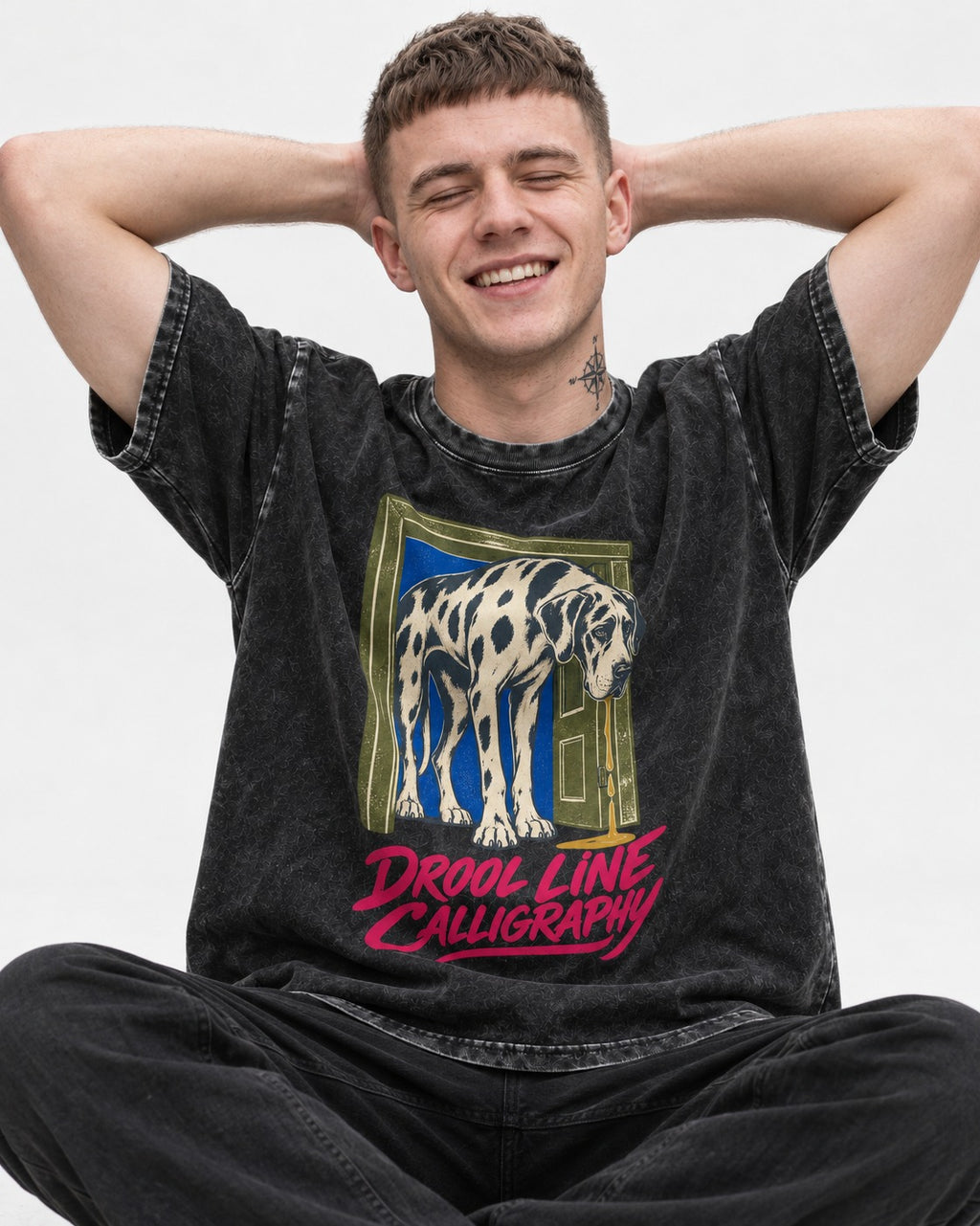 Great Dane Drool Line Calligraphy Doorway Graphic Washed Tee in Black, worn by a seated model