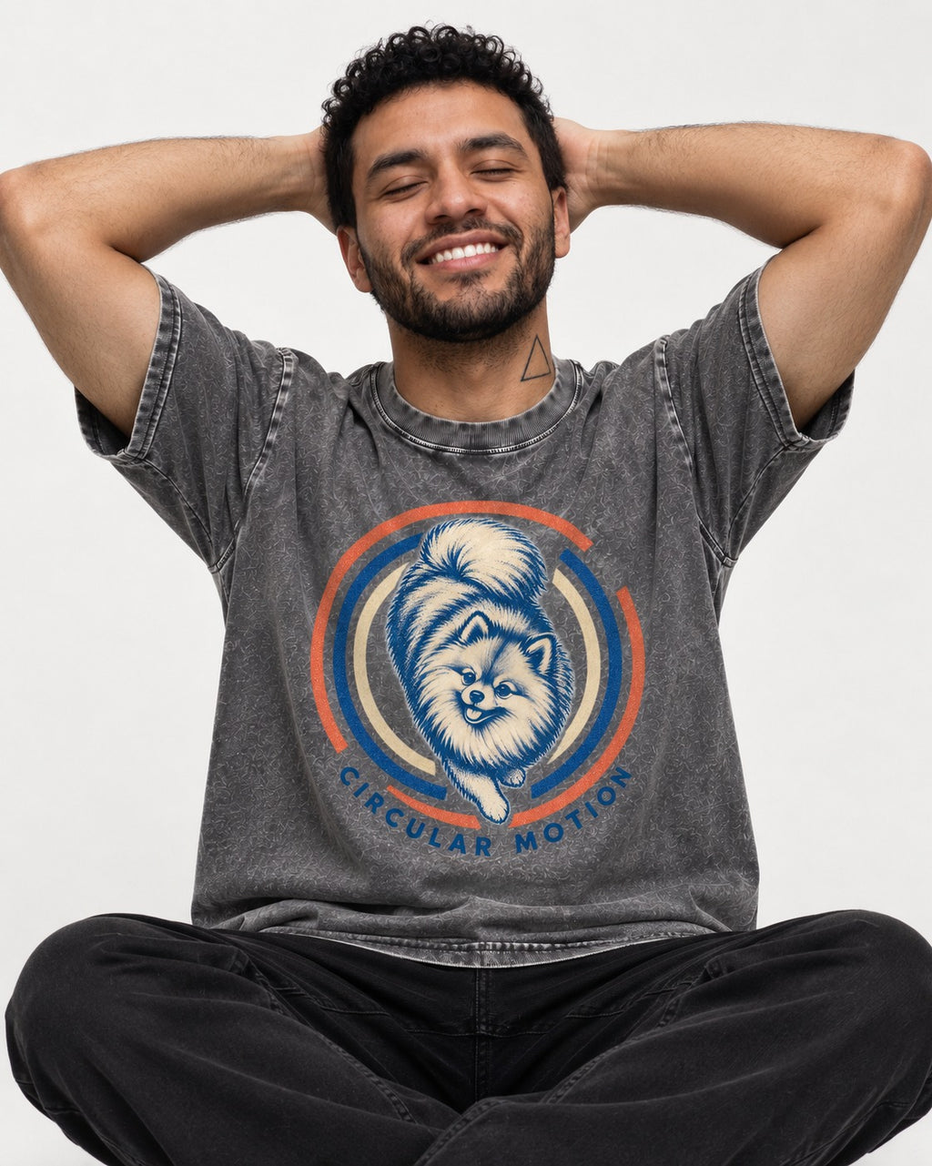 Pomeranian Circular Motion Washed Tee in Gray, worn by a seated model