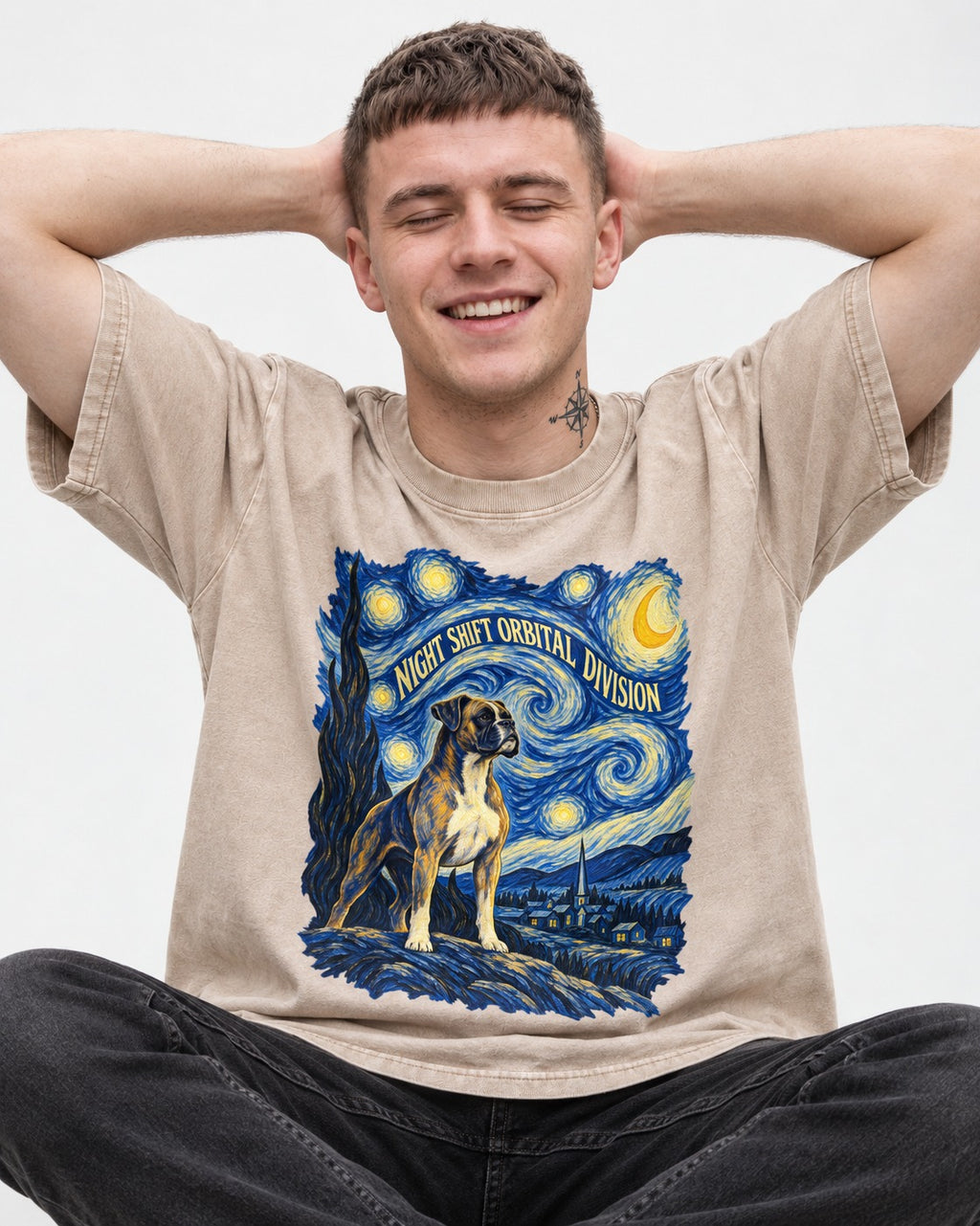 Night Shift Orbital Division Boxer Night Sky Graphic Washed Tee in Apricot, worn by a seated model