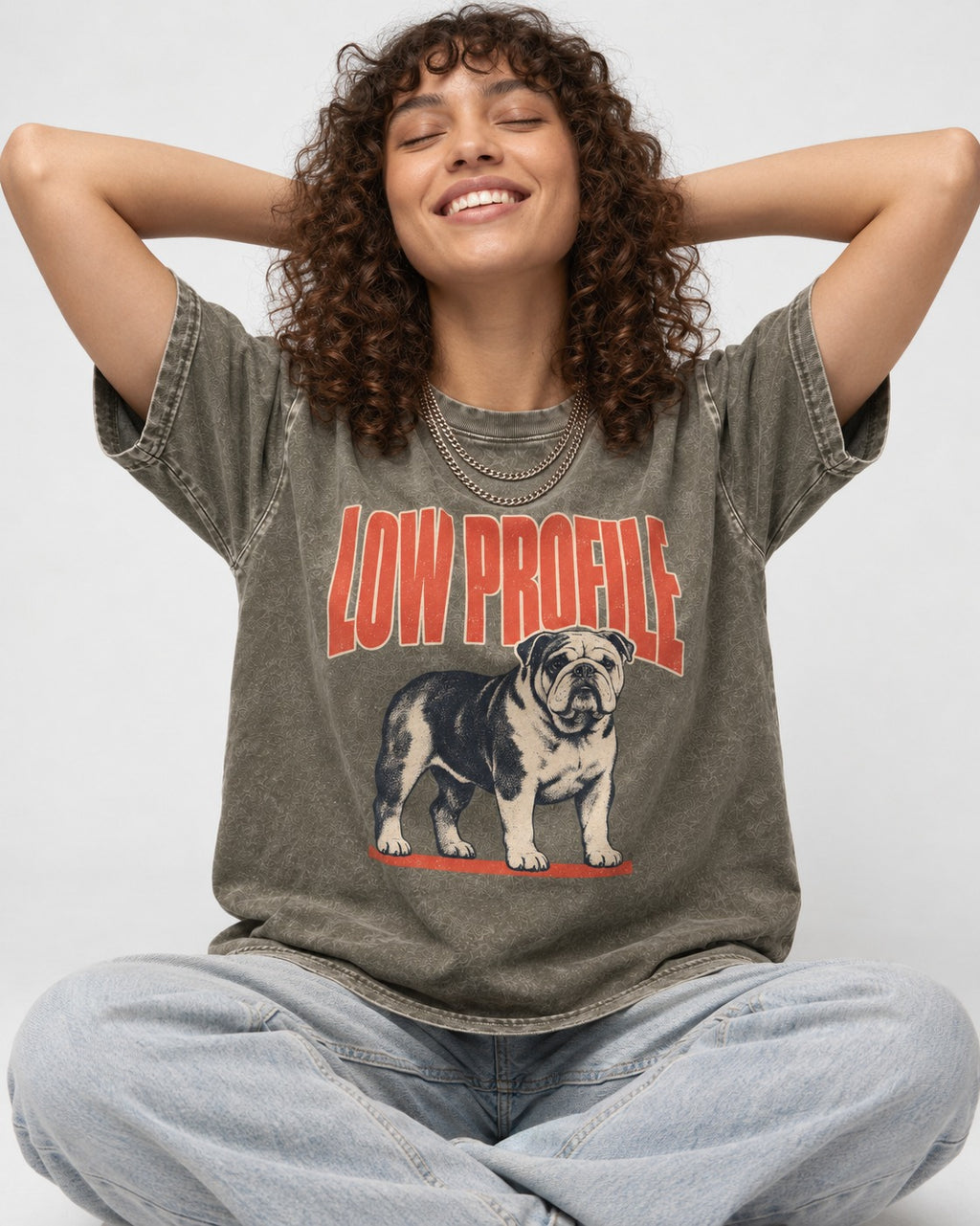 English Bulldog Low Profile Standing Graphic Washed Tee in Army Green, worn by a seated model