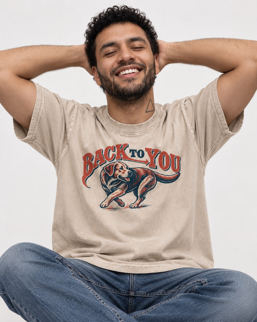 Labrador Retriever Back to You Turning Graphic Washed Tee in Apricot, worn by a seated model
