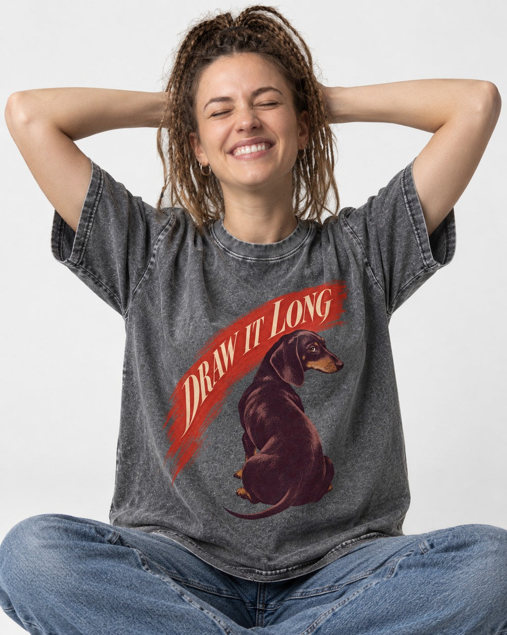 Draw It Long Dachshund Washed Tee in Gray, worn by a seated model