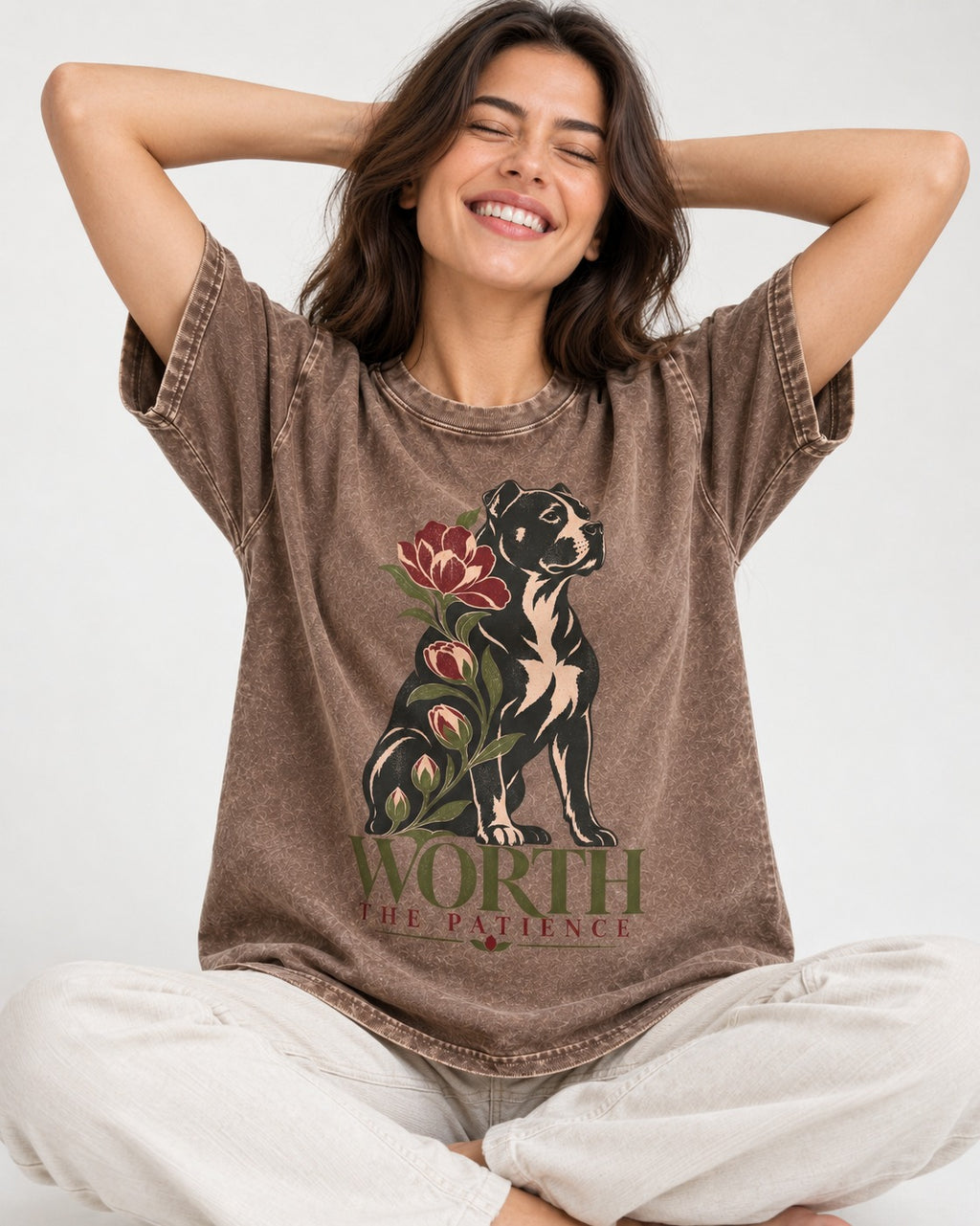 Pitbull Worth the Patience Washed Tee in Coffee, worn by a seated model