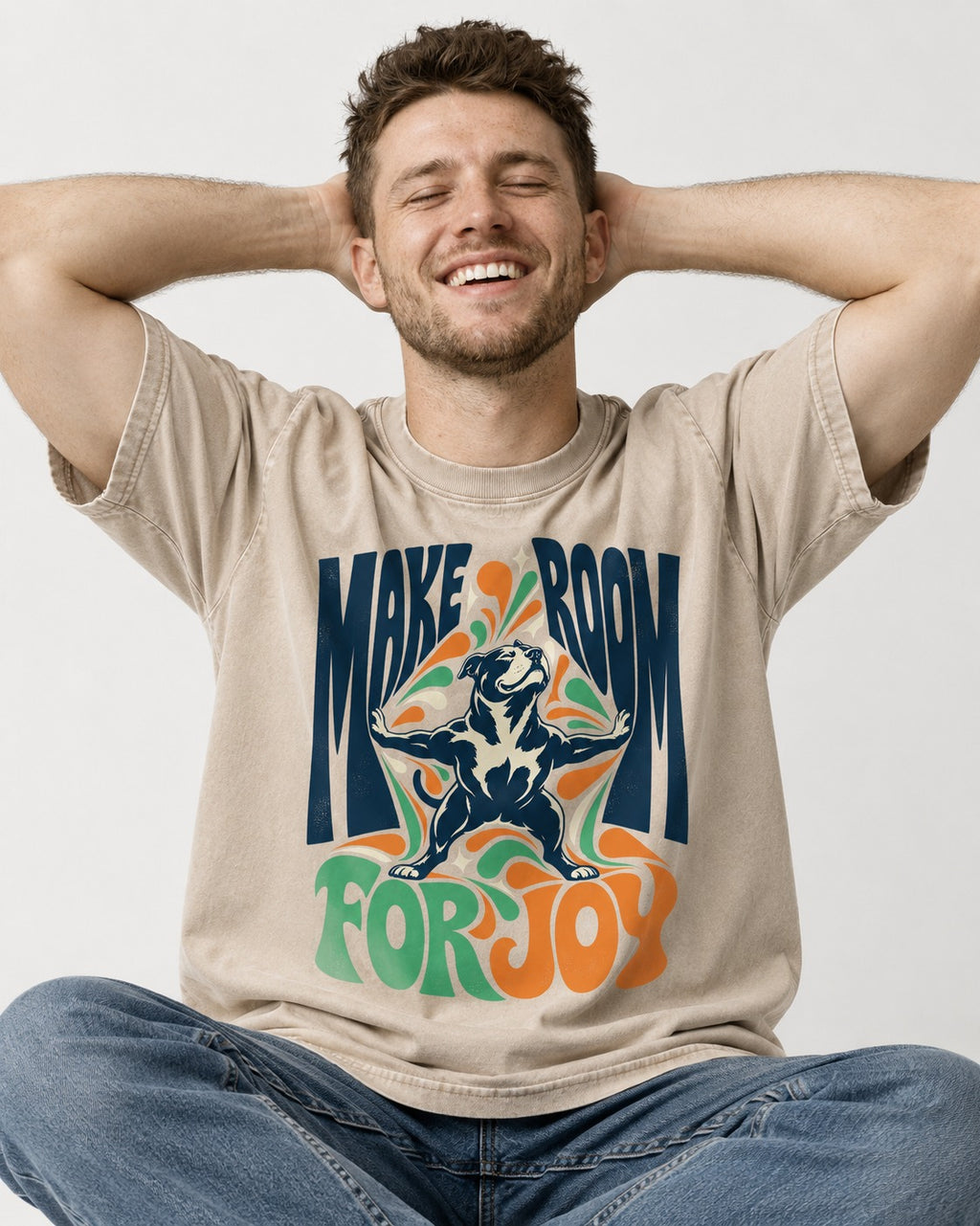 Pitbull Make Room for Joy Washed Tee in Apricot, worn by a seated model