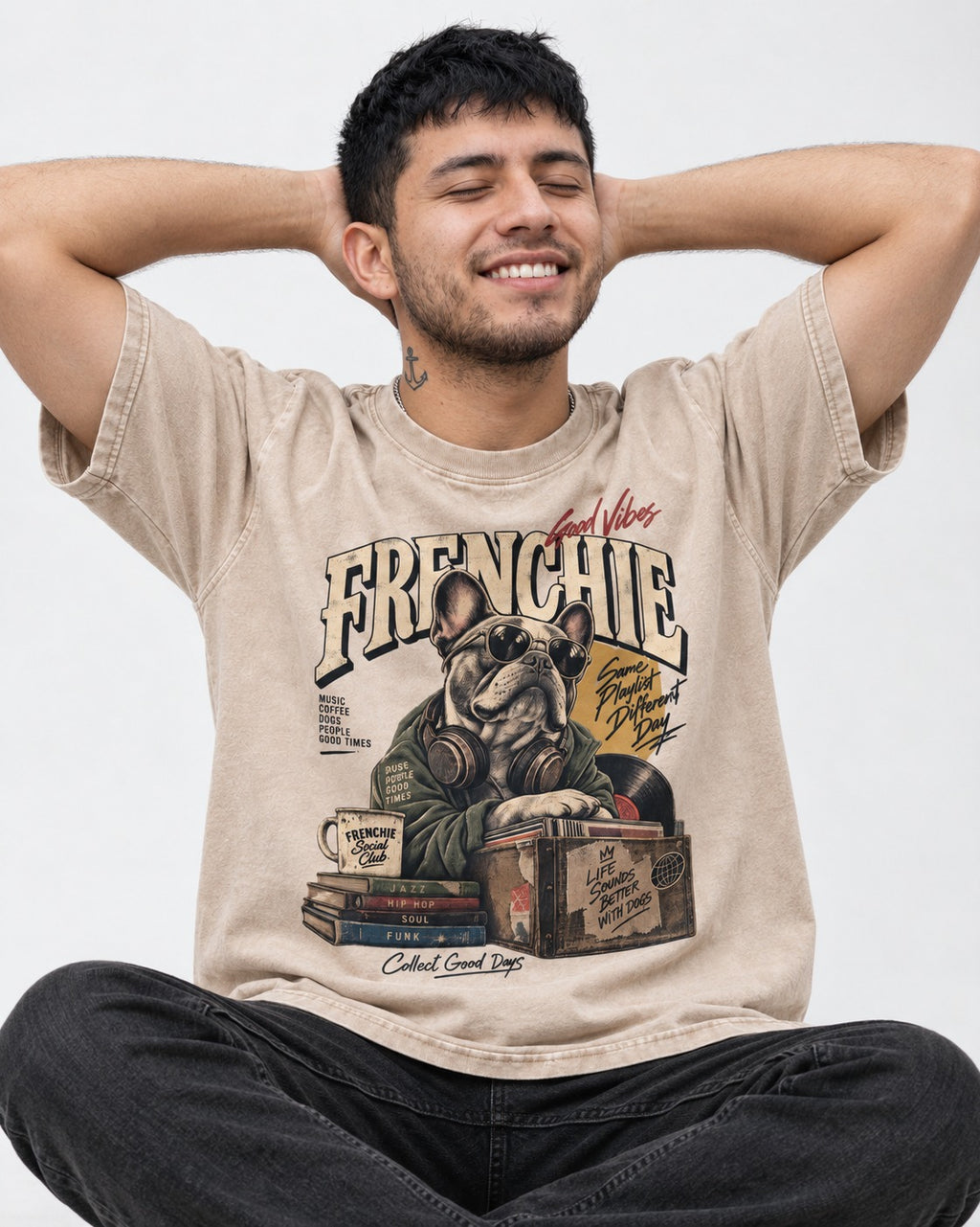 Frenchie Social Club Washed Tee in Apricot, worn by a seated model