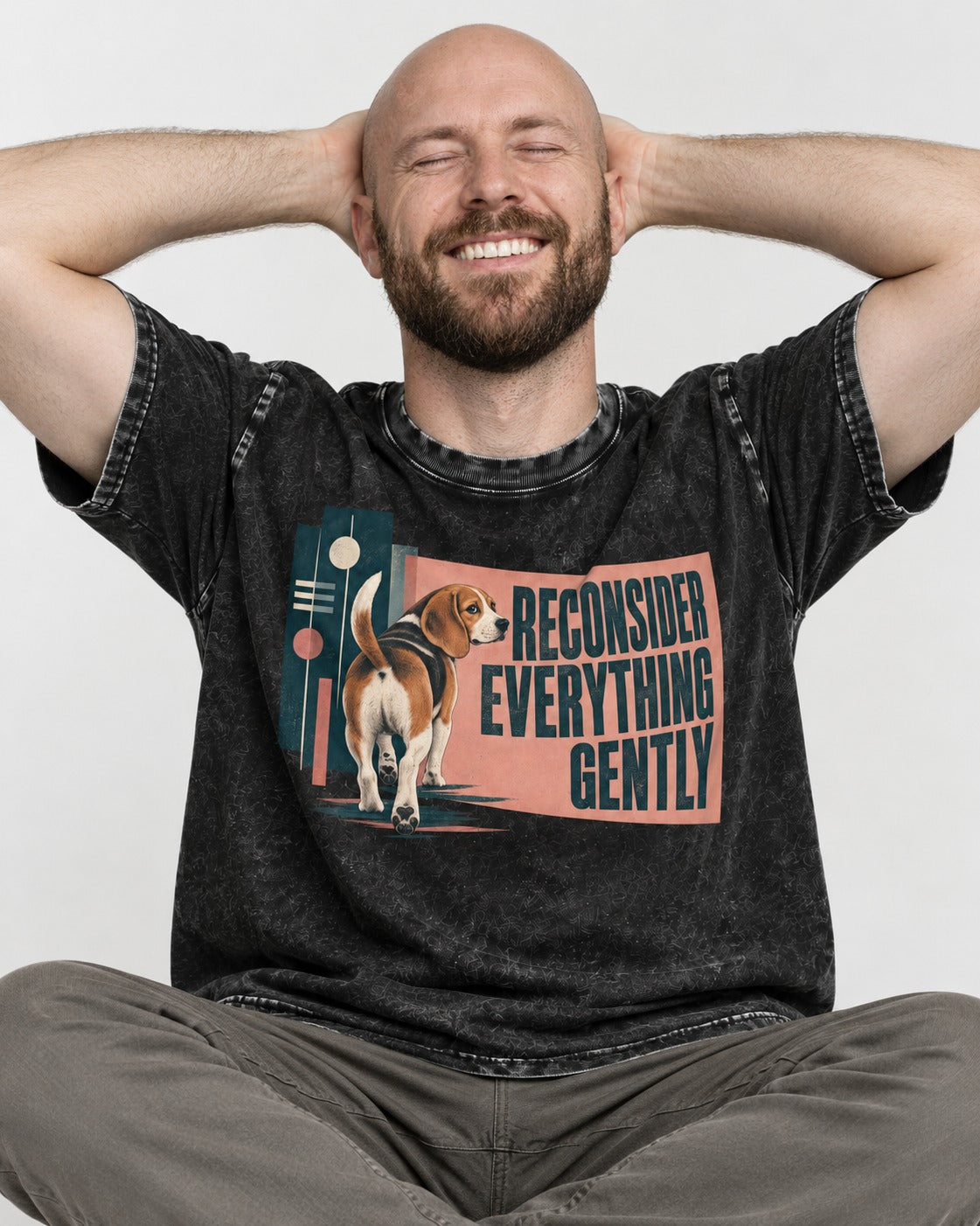 Beagle Reconsider Everything Gently Retro Graphic Washed Tee in Black, worn by a seated model