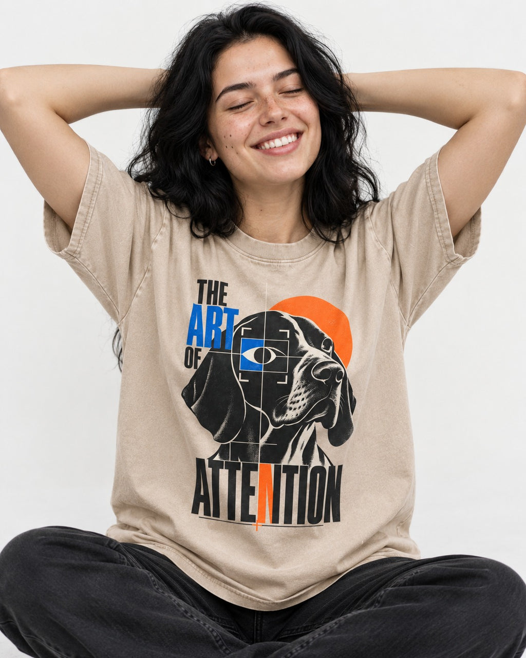 German Shorthaired Pointer Attention Washed Tee in Apricot, worn by a seated model