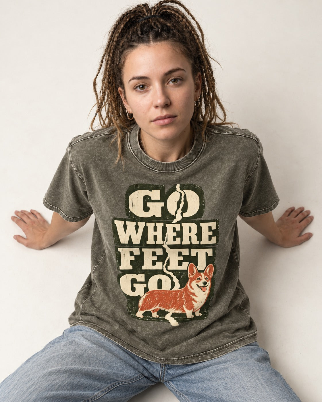 Corgi Go Where Feet Go Path Washed Tee in Army Green, worn by a seated model