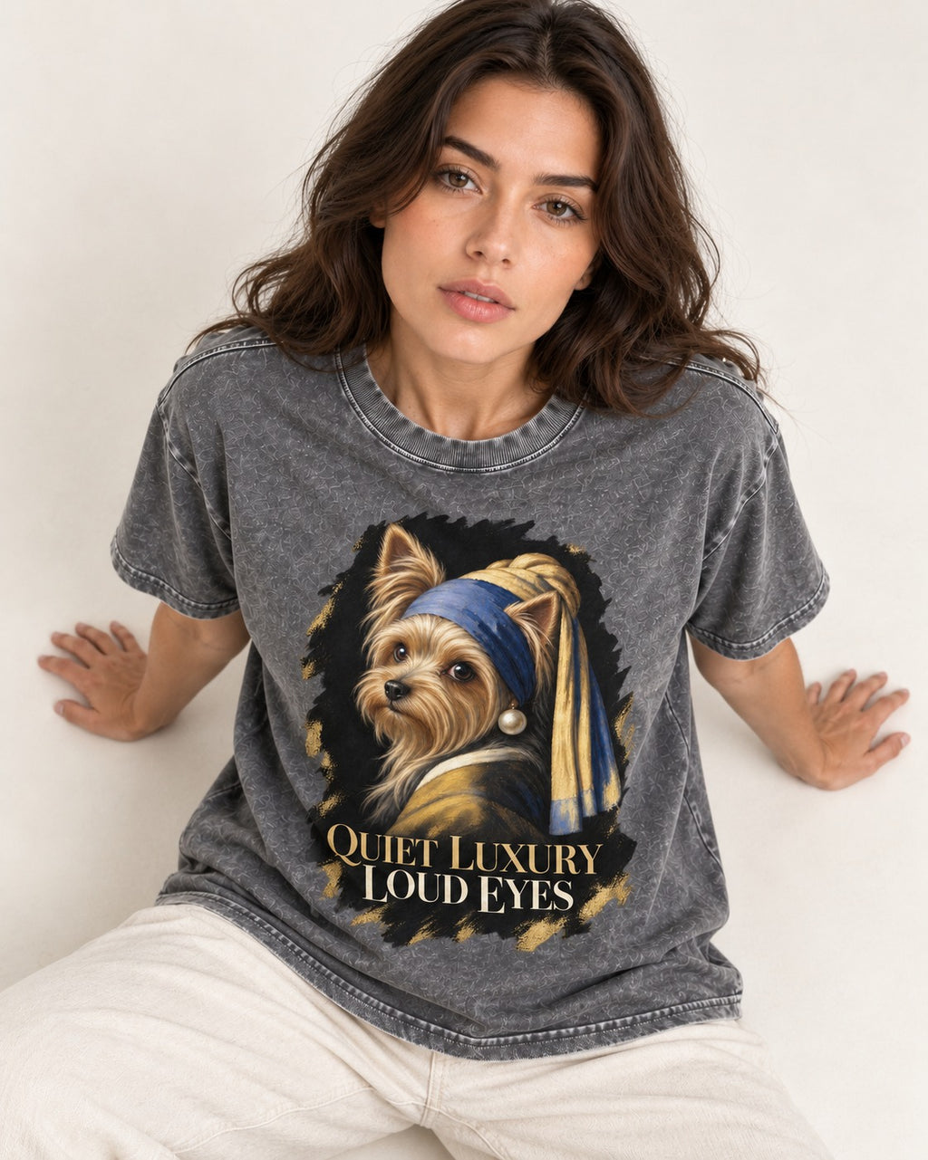 Yorkshire Terrier Quiet Luxury Loud Eyes Pearl Portrait Graphic Washed Tee in Gray, worn by a seated model