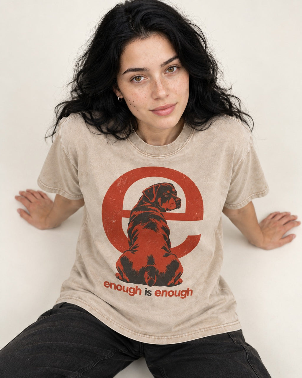 Rottweiler Enough Is Enough Washed Tee in Apricot, worn by a seated model