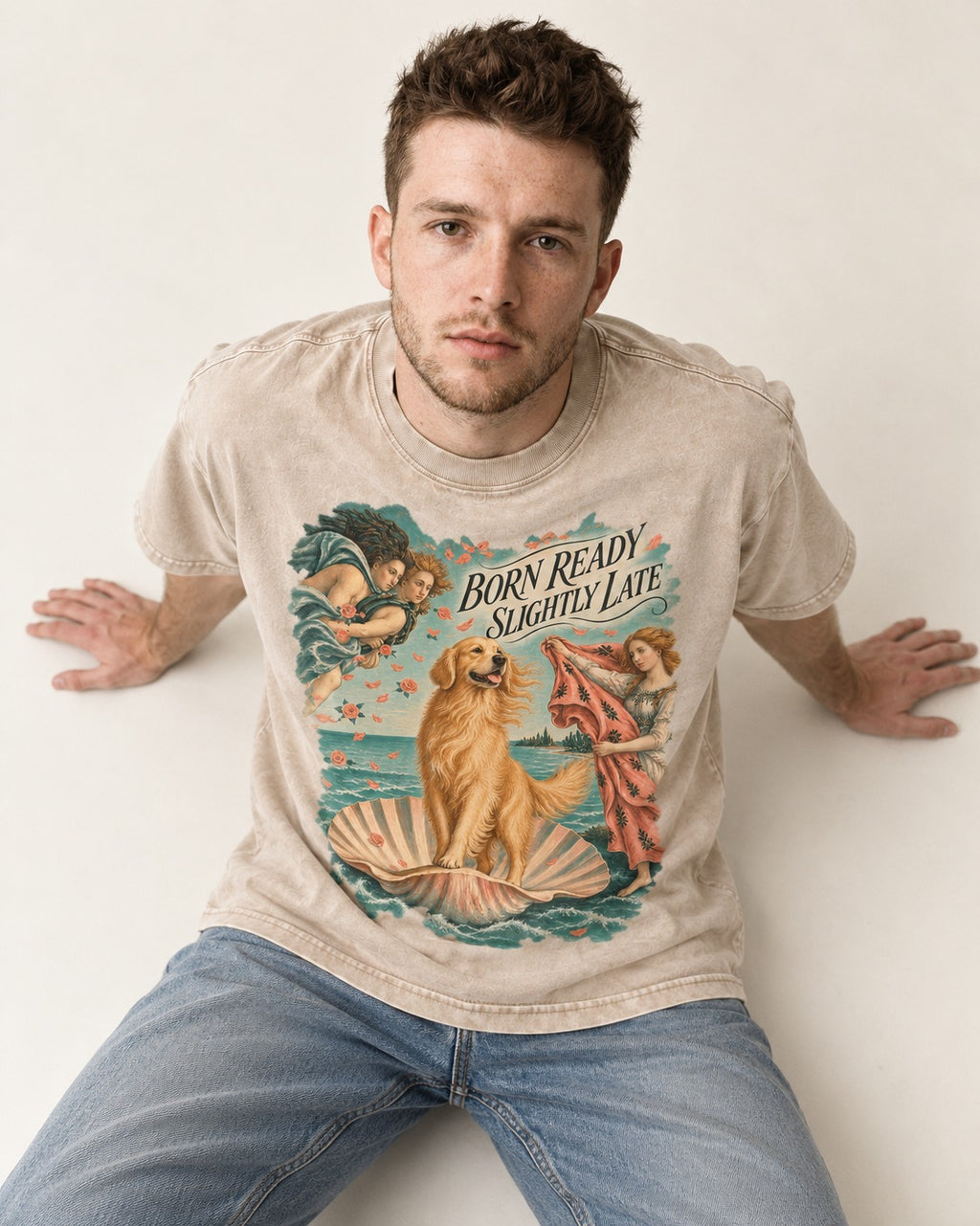 Born Ready Slightly Late Venus Golden Retriever Graphic Washed Tee in Apricot, worn by a seated model