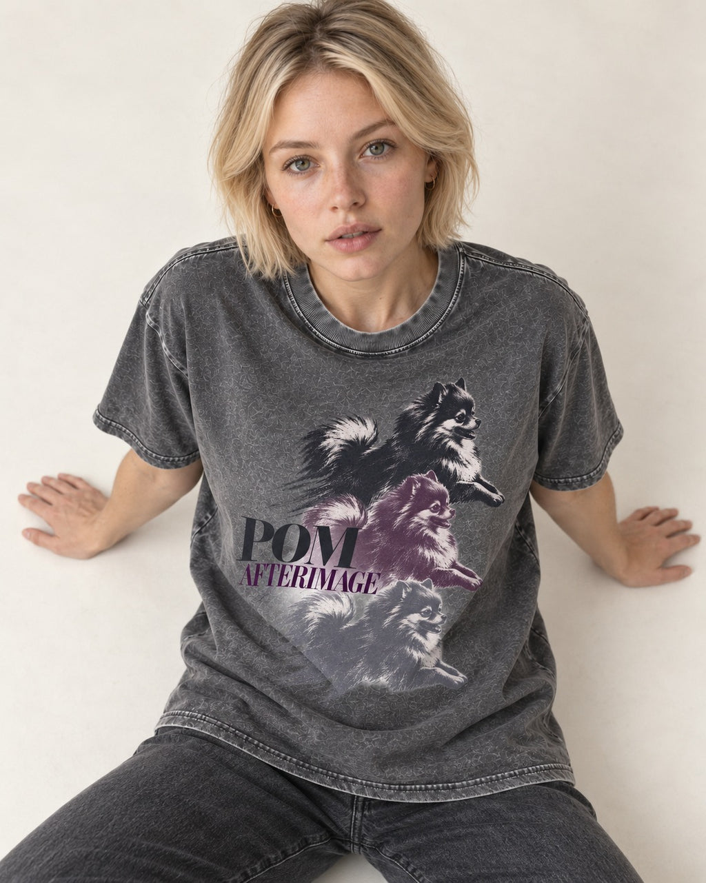 Pomeranian Afterimage Washed Tee in Gray, worn by a seated model