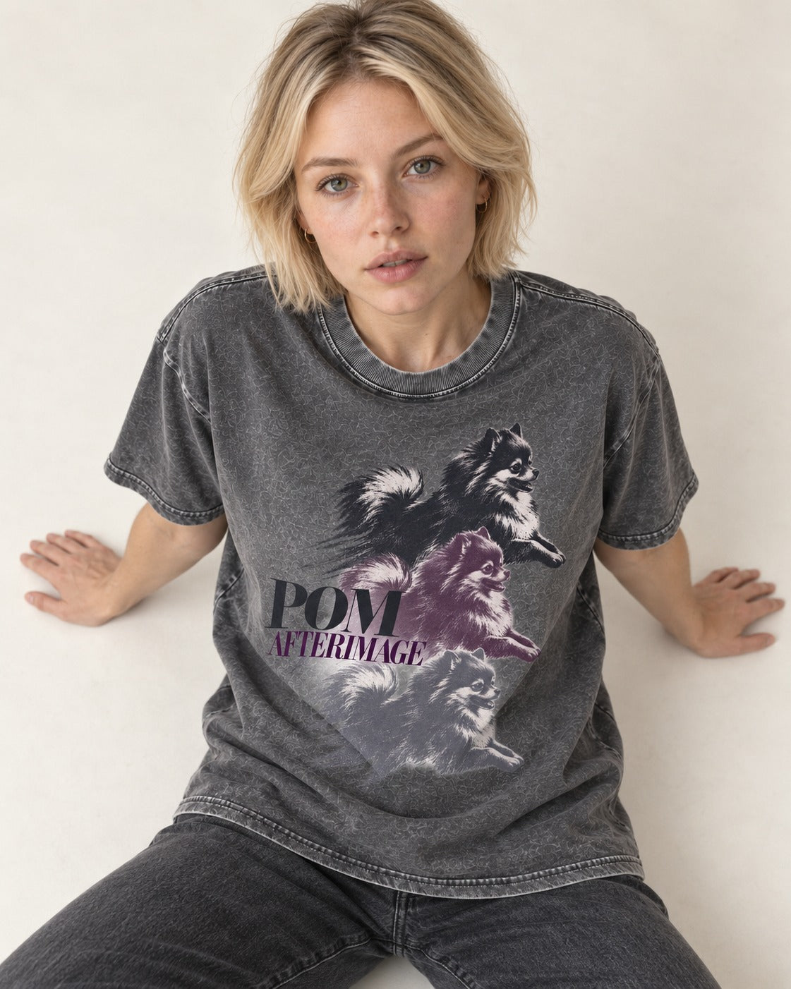 Pomeranian Afterimage Washed Tee in Gray, worn by a seated model