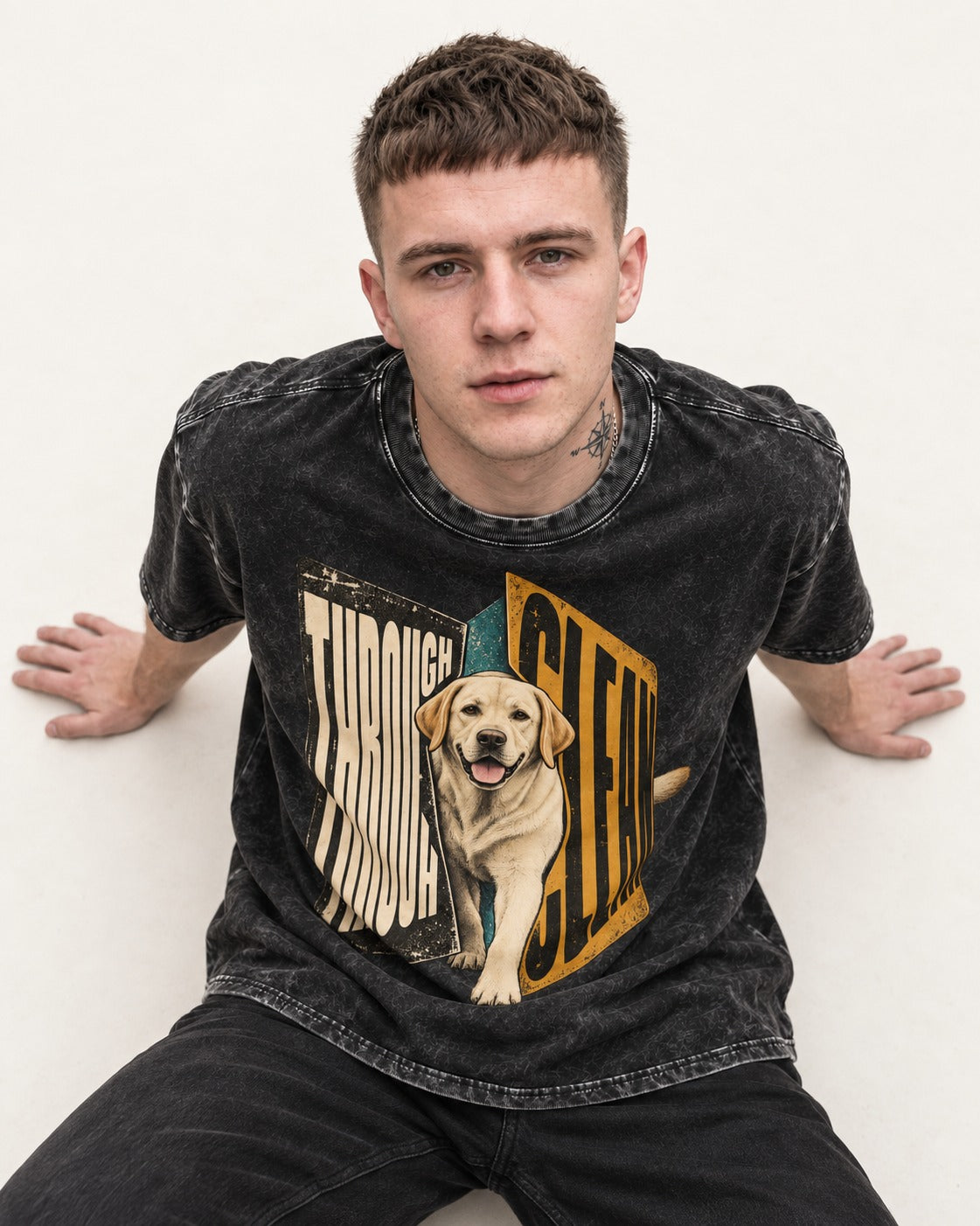 Labrador Retriever Through Steel Split Sign Graphic Washed Tee in Black, worn by a seated model