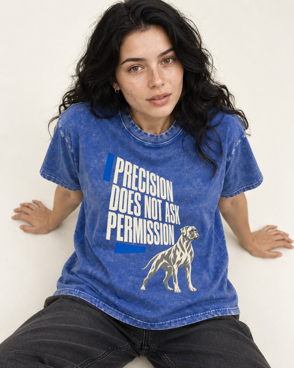 Precision Does Not Ask Permission Boxer Washed Tee in Royal Blue, worn by a seated model
