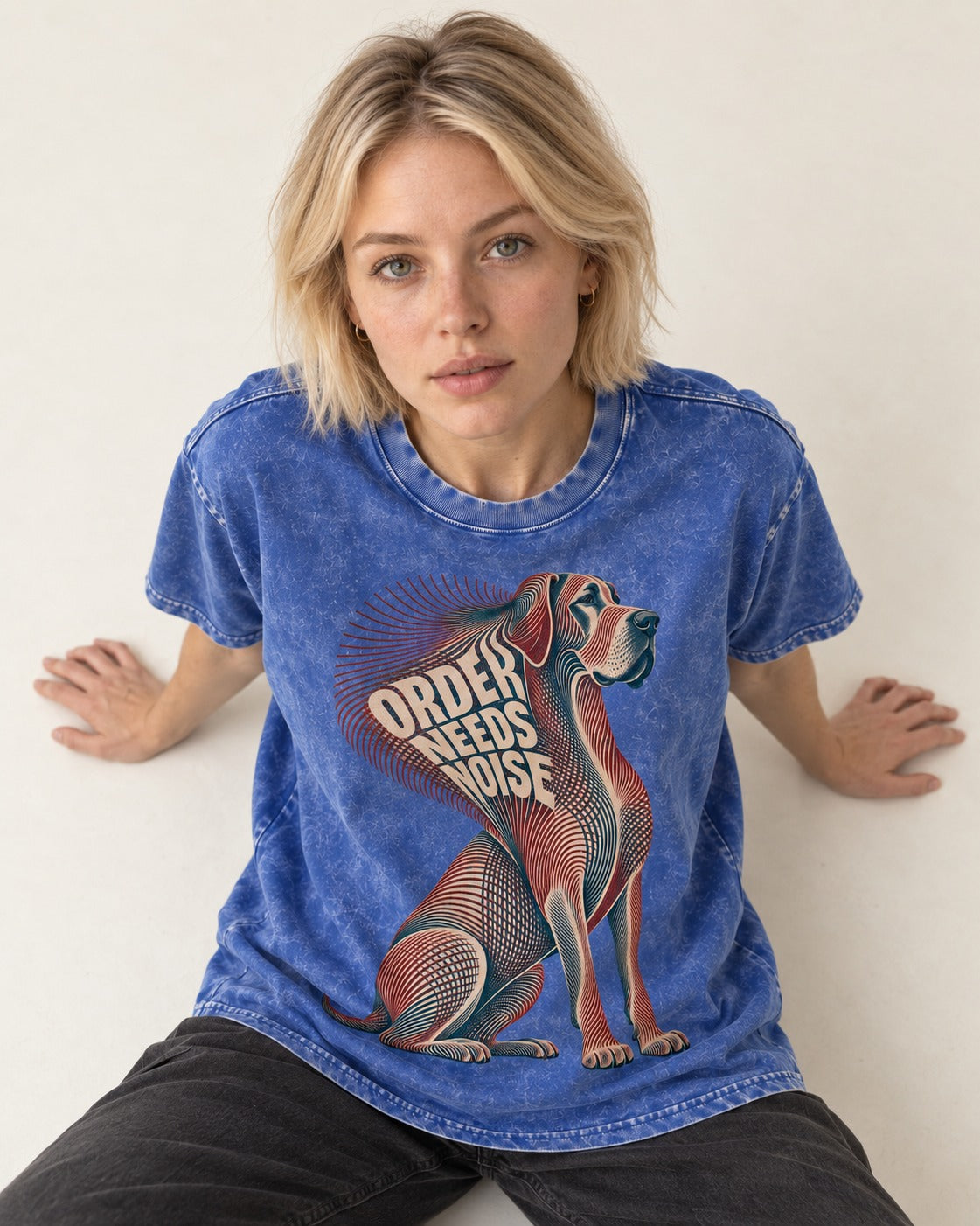 Great Dane Order Needs Noise Optical Line Graphic Washed Tee in Royal Blue, worn by a seated model