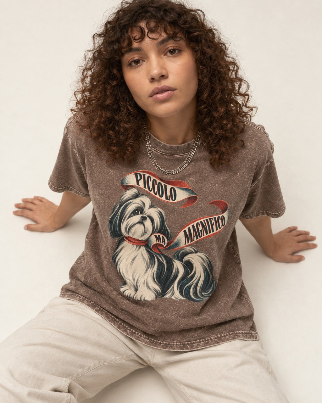 Piccolo Ma Magnifico Shih Tzu Washed Tee in Coffee, worn by a seated model