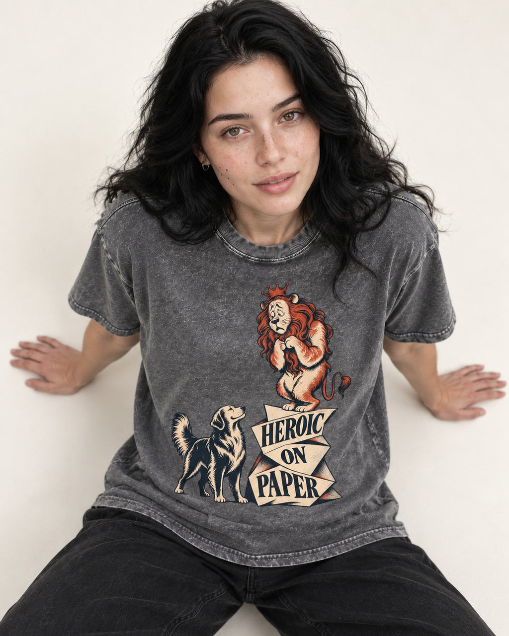 Golden Retriever Heroic on Paper Lion Graphic Washed Tee in Gray, worn by a seated model