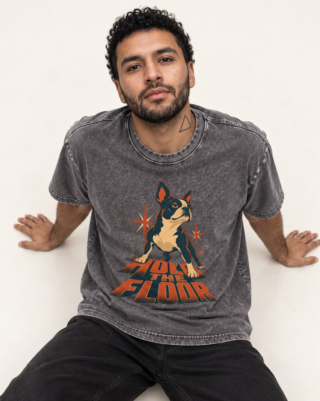 Boston Terrier On The Floor Perspective Graphic Washed Tee in Gray, worn by a seated model