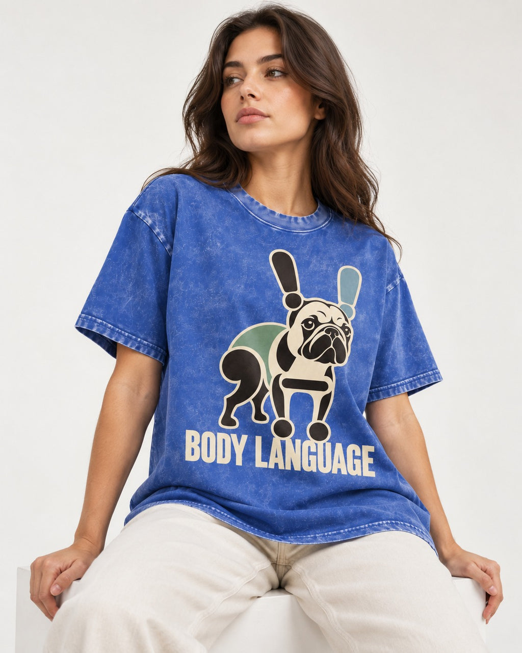 Frenchie Body Language Punctuation Graphic Washed Tee in Royal Blue, worn by a seated model