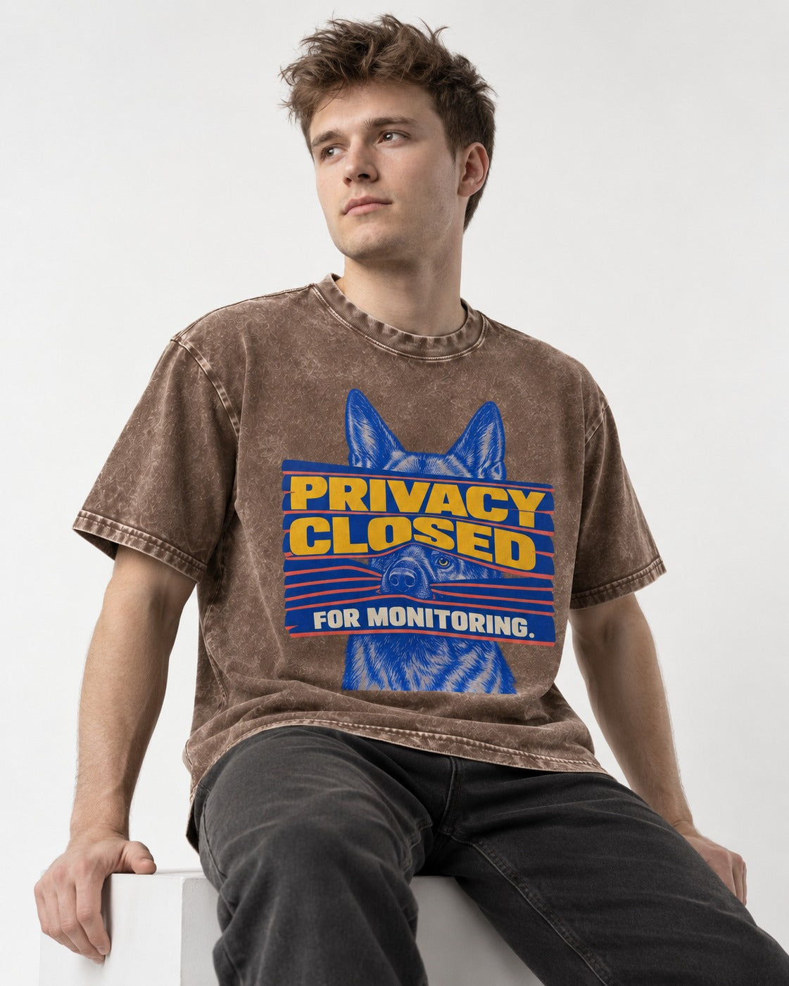German Shepherd Dog Privacy Closed for Monitoring Washed Tee in Coffee, worn by a seated model