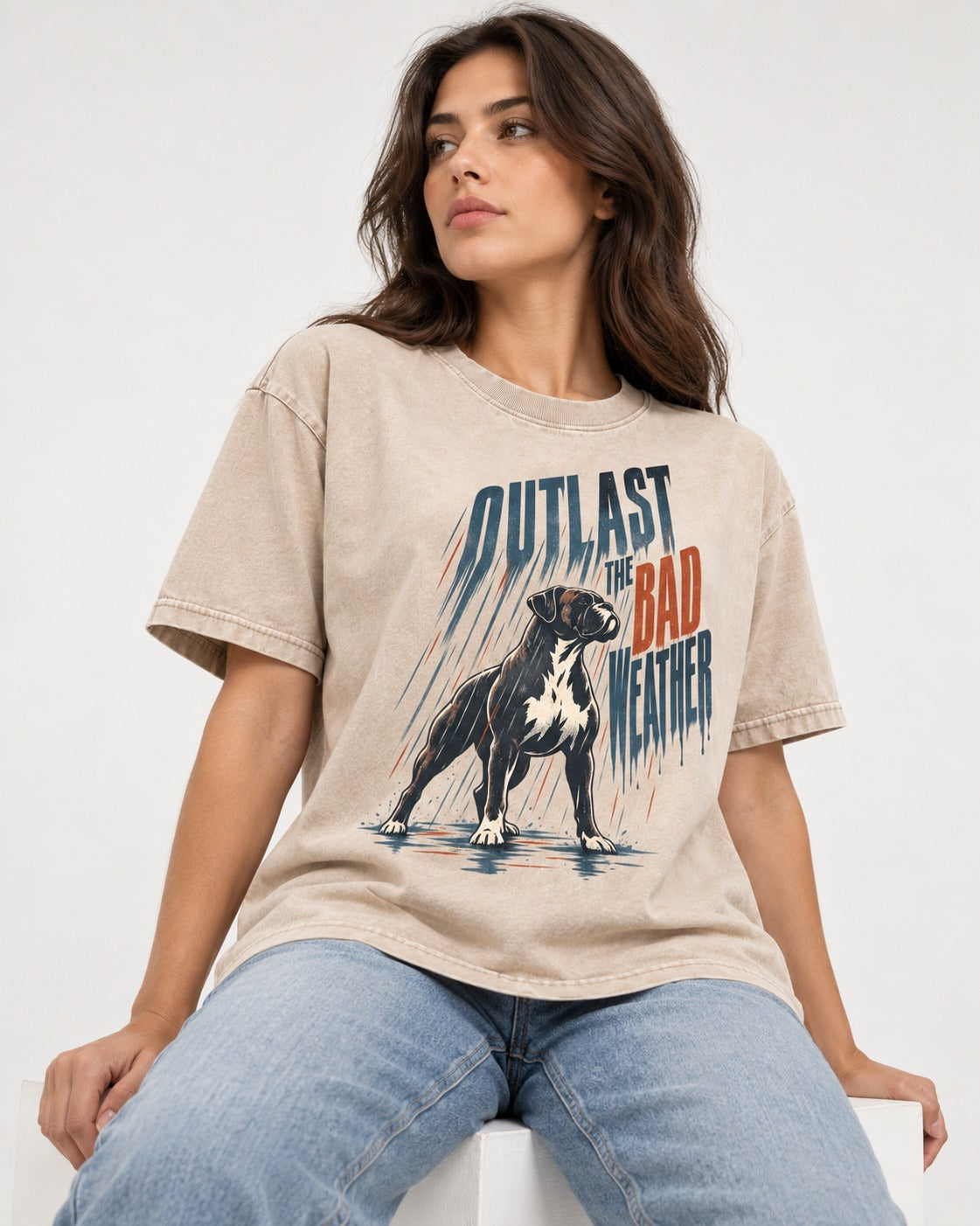 Boxer Outlast the Bad Weather Washed Tee in Apricot, worn by a seated model
