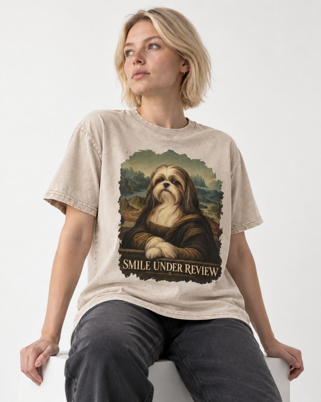 Shih Tzu Smile Under Review Old Master Portrait Graphic Washed Tee in Apricot, worn by a seated model