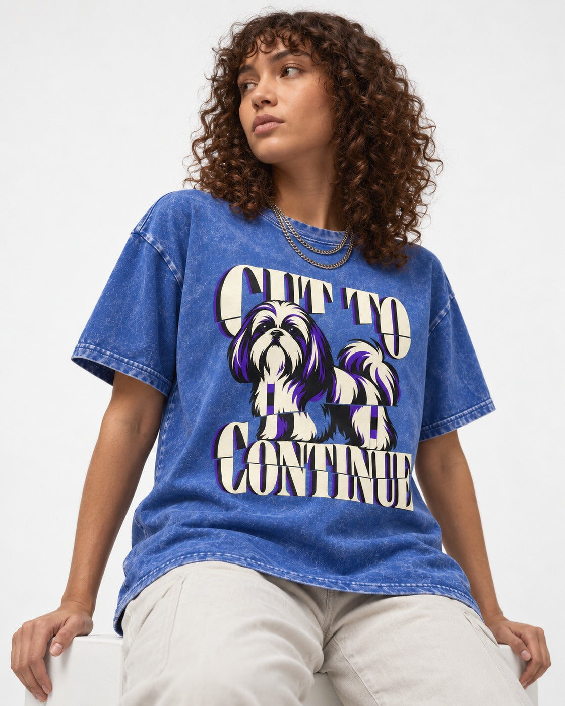 Shih Tzu Cut to Continue Dimensional Typography Graphic Washed Tee in Royal Blue, worn by a seated model