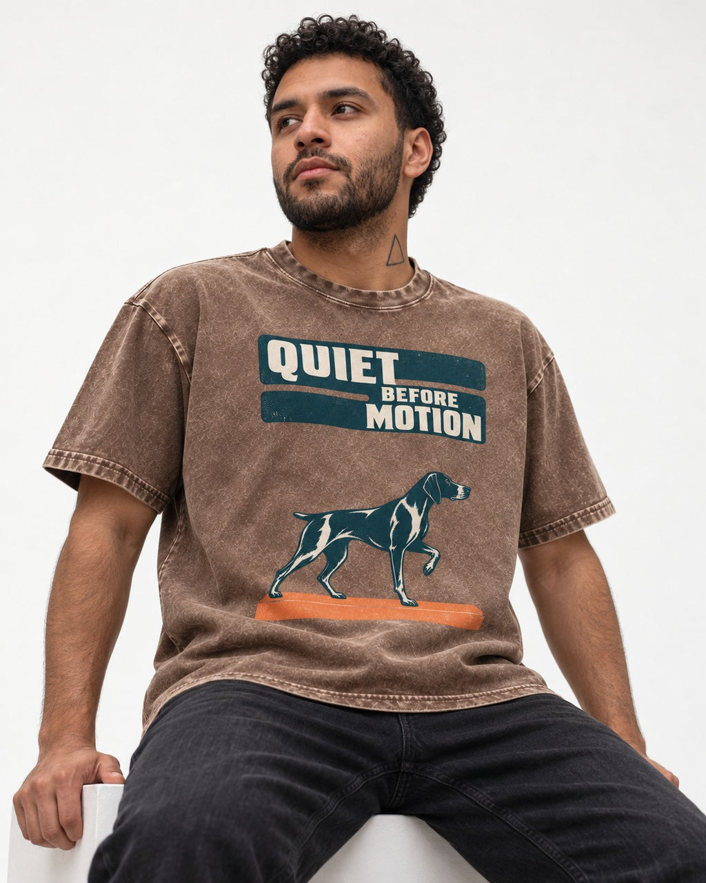 Quiet Before Motion German Shorthaired Pointer Washed Tee in Coffee, worn by a seated model
