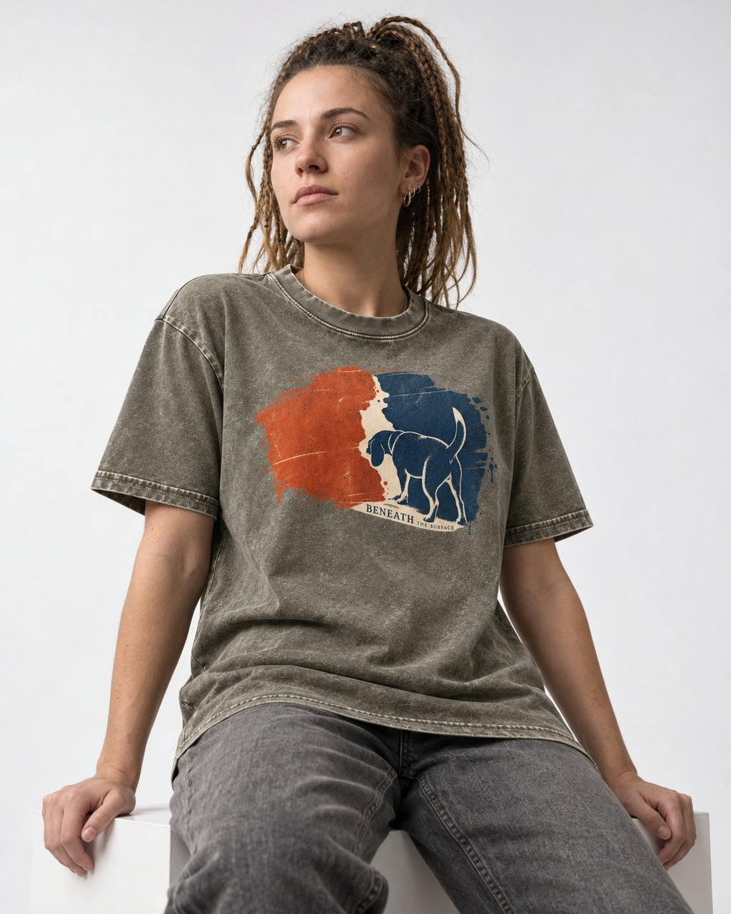 Beagle Beneath The Surface Scent Trail Washed Tee in Army Green, worn by a seated model