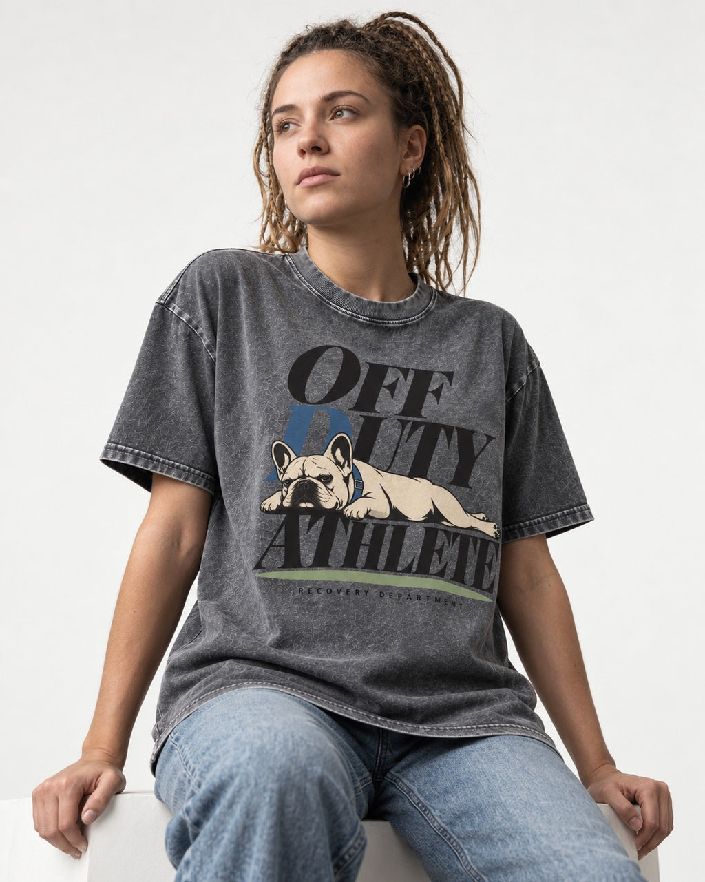 Off Duty Athlete Frenchie Washed Tee in Gray, worn by a seated model