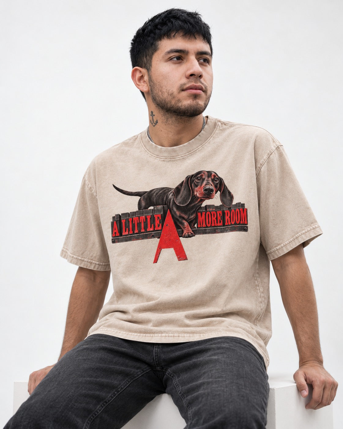 More Room for Dachshund Washed Tee in Apricot, worn by a seated model