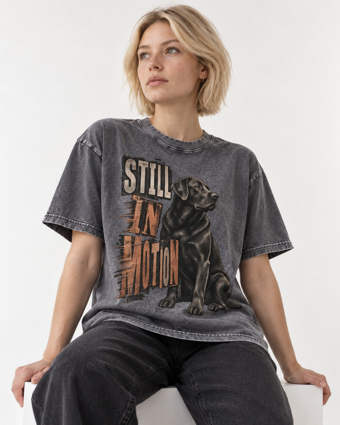 Labrador Retriever Still in Motion Seated Graphic Washed Tee in Gray, worn by a seated model