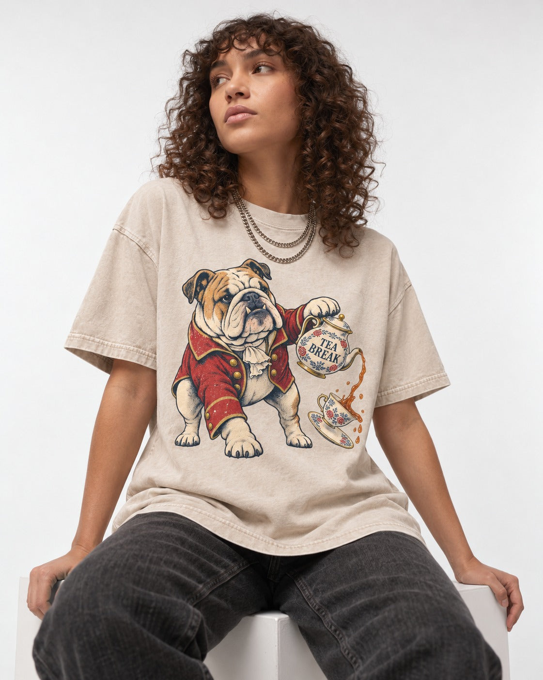 English Bulldog Tea Break Washed Tee in Apricot, worn by a seated model