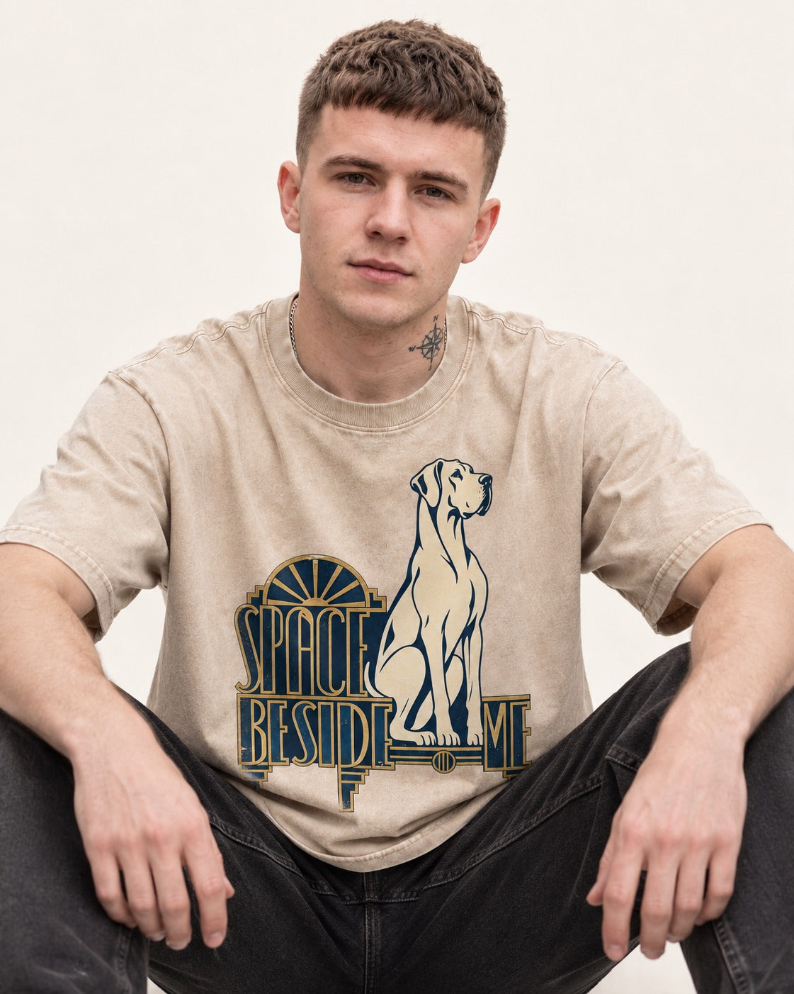 Great Dane's Space Beside Me Washed Tee in Apricot, worn by a seated model