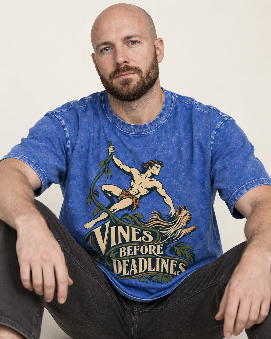 Yorkshire Terrier Vines Before Deadlines Jungle Hero Graphic Washed Tee in Royal Blue, worn by a seated model