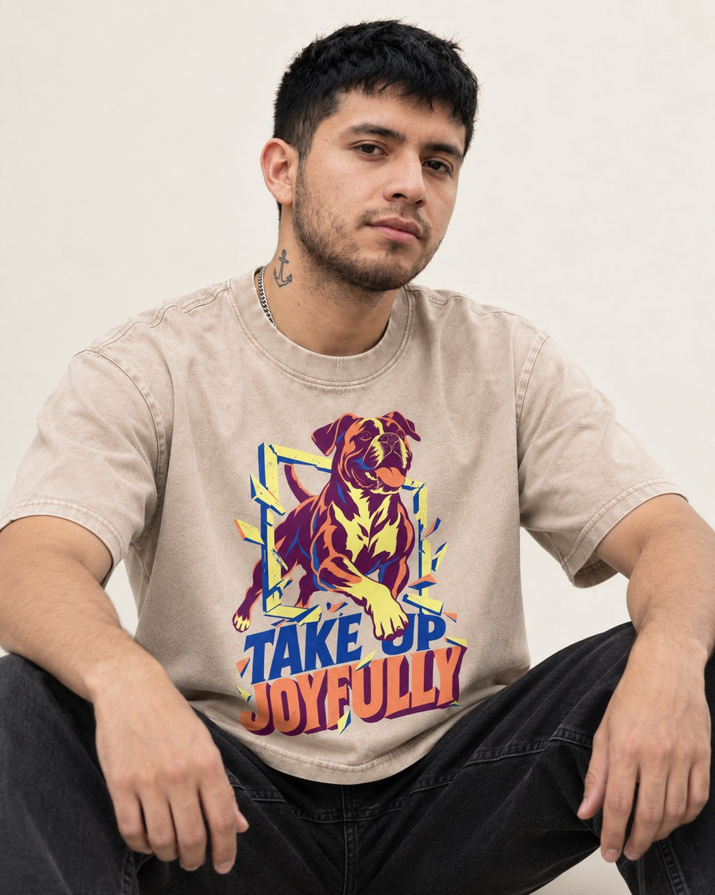 Take Up Joyfully Boxer Breakthrough Graphic Washed Tee in Apricot, worn by a seated model